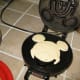 Fill in the ears and face, leave a small gap at the bottom for excess to run in to. Close the lid.