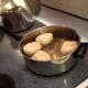 Fry the biscuits in shortening just over 350 degrees. Brown one side and then flip the biscuit (total time is about one minute for per biscuit) .