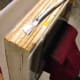 Yes, this is the yellow book from the "DO NOT" image above. I have scraped off as much of the duck tape and loose glue as I could.