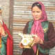 The Mother dressed up in traditional attire during Gochi festival