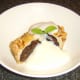 Puff pastry mincemeat pie with rum sauce
