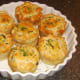 Mini haggis and clapshot puff pastry pies served garnished with chives