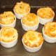 Mini haggis and clapshot puff pastry pies removed from oven