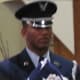 Taps were performed during the memorial in recognition of "Blue's" military service.