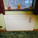 Original radiator from the sofa relocated to under the window