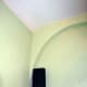Speaker wires completely hidden behind coving and inside false arch