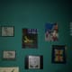 Some of the patient's paintings completed during their arts activities are set up for viewing in a section of the mental facility.