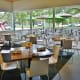 Interior dining space with adjacent outdoor patio