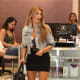 Kim Kardashian shopping in a black mini skirt and gladiator high heels