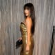 Kim Kardashian wearing sexy a strapless dress and high heels