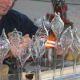First Step: Fabricator Swirling Molten Glass within Mold Held at Constant Temperature by Propane Torch