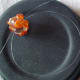 Threading the bead to attach it to necklace without crimps.