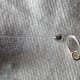 One of only two crimps used to create necklace closure before covered with crimp cover.