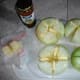 Cut each onion into 4 wedges, then add butter, garlic, salt and pepper.