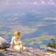 A woman overlooking a valley, near a cliff. The pastel colors are beautiful, and the valley below looks almost like a patchwork quilt. 1915 by Charles Courtney Curran.