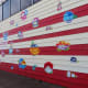 Florals on Red & White Striped Mural by Josue Ramirez at 2112 Leeland Street in Houston