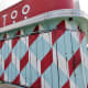 The corner of the building with red and teal diamonds mural