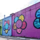 View of the Emoji Flowers Mural by Scott Tarbox