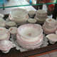 Serving pieces, sugar and creamers make the set more valuable