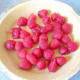 Cleaned, washed, drained raspberries in graham cracker crust.