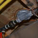 My gas line is now grounded: copper wire attached to the black iron pipe on either side of the aluminum regulator