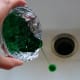 Pour off the excess liquid from the crystallized sugar.