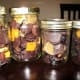 Chocolate covered dried fruits in a jar
