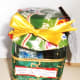 Jar decorated with wrapping paper and ribbons