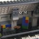 LEGO Creator Parisian Restaurant Modular Building | You can pull down a nice little panel that reveals an artist studio with heater, easel, paintbrush, palette and artwork.