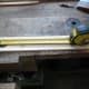 Measuring and marking the desired length for the stand.