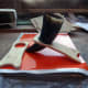 The Viking drinking horn in its stand after hand sanding.