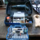 All the accessories for the dremel, including sanding disks.