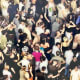 Part of the German artist Andreas Gursky's photo," Mayday IV, 2000". He presents reality in a unique way through his sensitive approach to the identity of the motifs in his works, challenging the limits of photography.