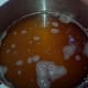 I use raw cane sugar to make a syrup and add this to the fruit pulp.