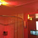 The infamous pink bathroom with a TV in the mirror at The Flamingo.