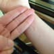 1. To locate your carpal tunnel syndrome reflexology point, place your three fingers below your hand.