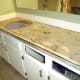 Countertop's surface is roughened for better adhesion.