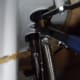 Using adjustable wrenches, disconnect the water lines from the sink.