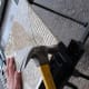 After cuts have been made, use a hammer to carefully knock off the strips.