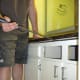 Use a pry bar to pry the countertop from the cabinets.
