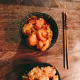 I love eating fried noodles in a bowl and I like using chopsticks while eating the noodles.