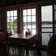 Tables next to the windows over looking Carvers Pond, The Harbor Gawker Restaurant.