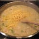 add sauce and cheese to fish
