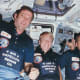 The crew of 41C poses in jubilation after their daunting repair of the Solar Max satellite.