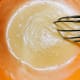 Whisk the mixture until it's fluffy and light in color.