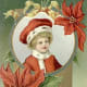 Little boy with poinsettias