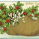 Wooden show with holly and mistletoe