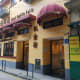 Entrance to the shop (green door on the right)