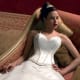 Sweetheart neckline, corset bodice, spaghetti straps and full skirt.