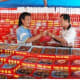 Man Selling Moon Cakes in Pontianak, Borneo, Indonesia